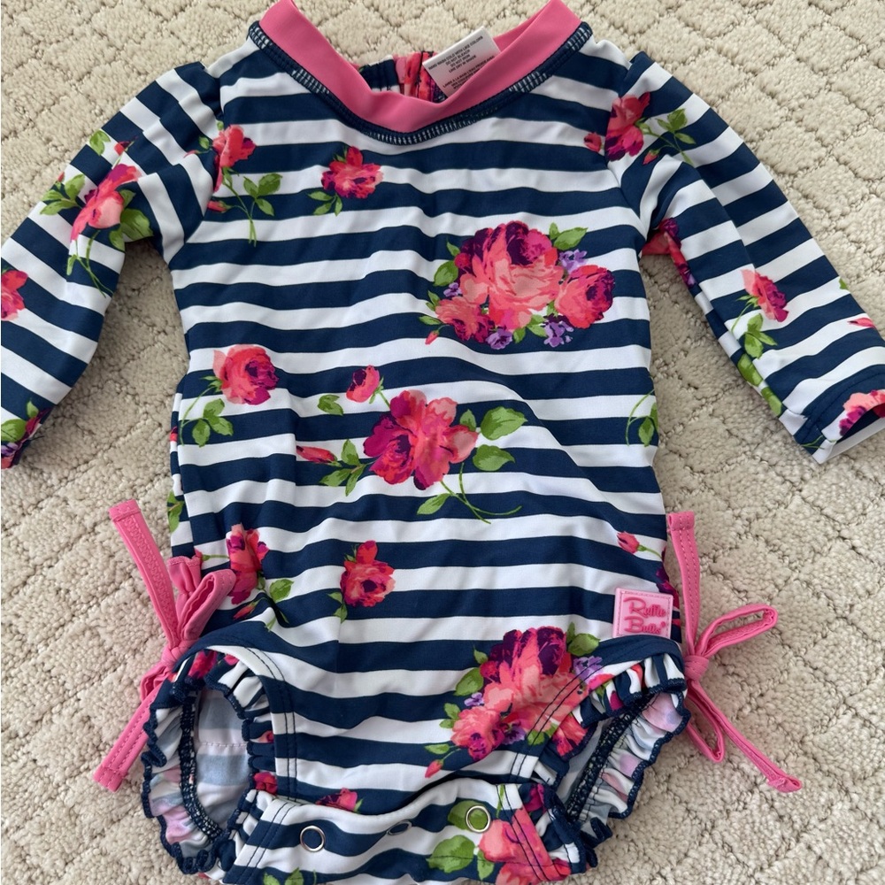 Ruffle Butts Navy and Pink Floral Striped Baby Girl’s Swimsuit Rash Guard